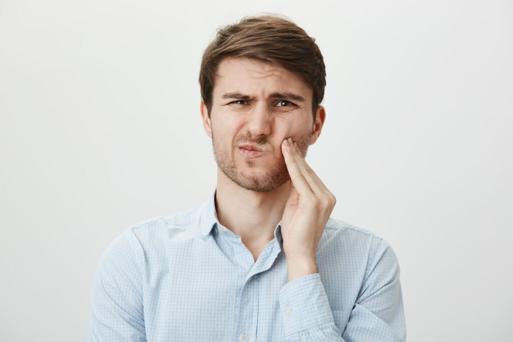 a Man with Sensitive Teeth in Brentwood