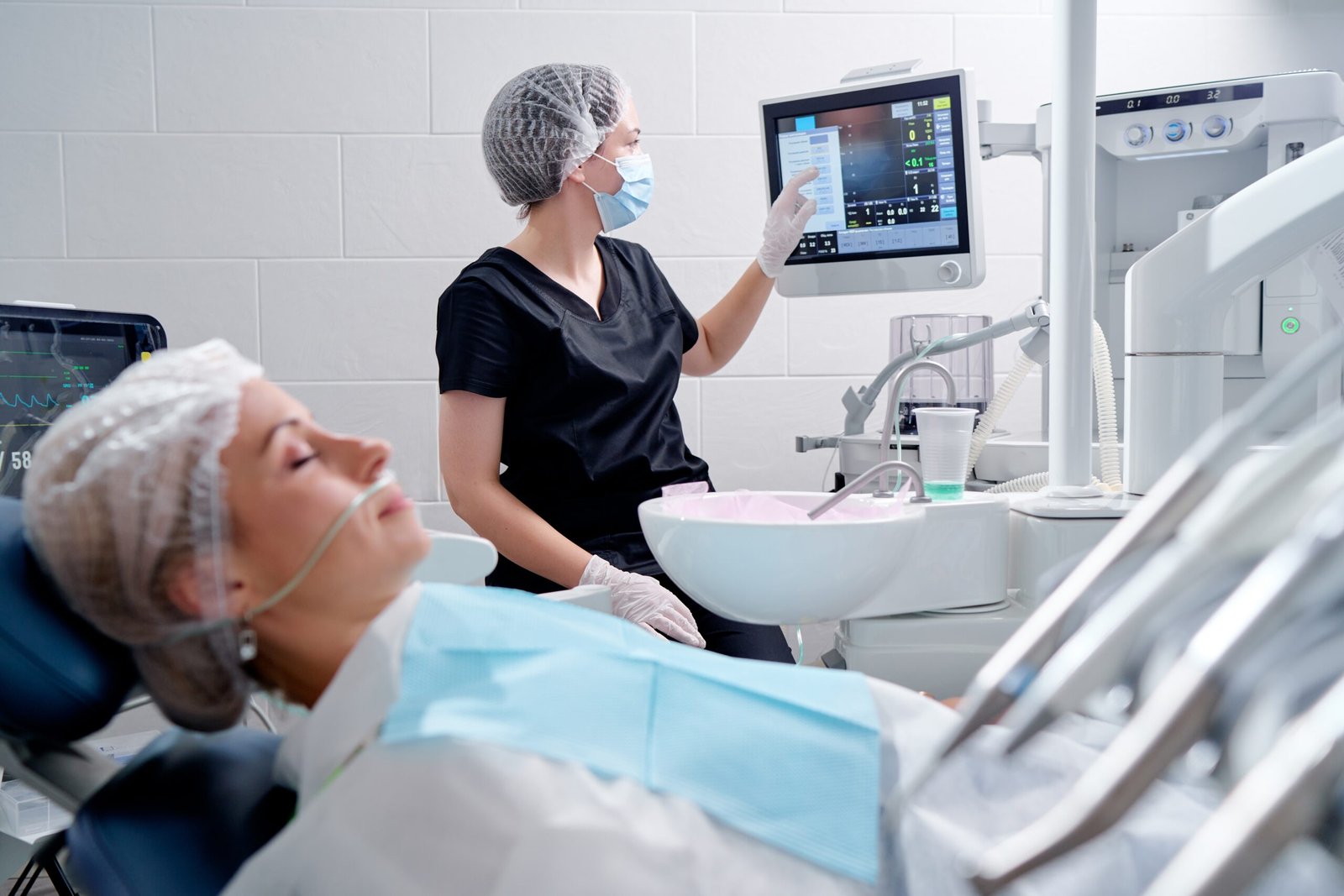 Sedation Dentistry for Dental Anxiety in Brentwood, showing patient comfort and a reassuring professional interaction.